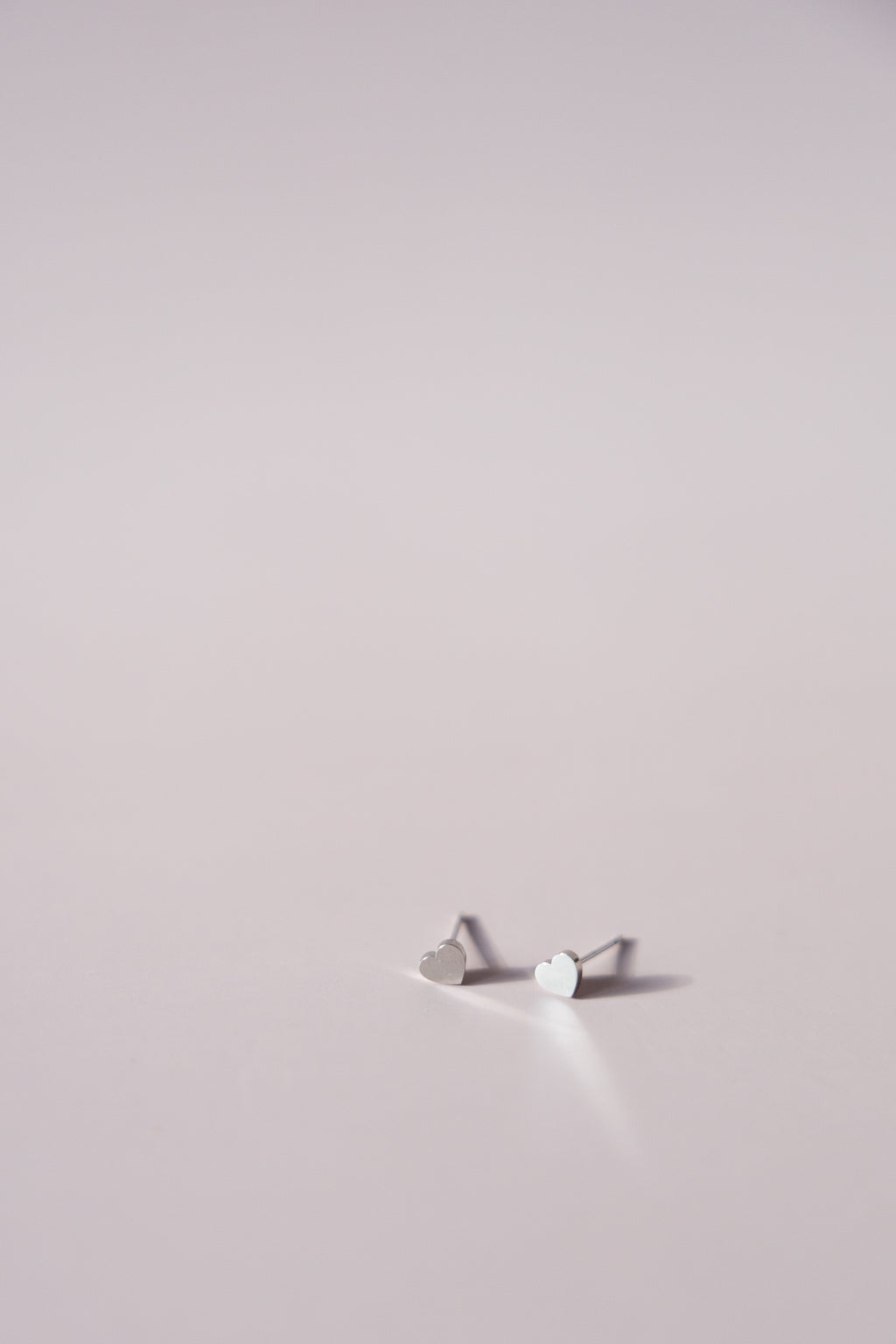 TINY HEARTS BIG MEANING EARRINGS